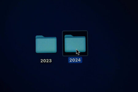 A computer screen showing two folders labeled 2023 and 2024 with a cursor hovering over the 2024 folder, for “Key Trends in Alternative Assets in 2024 So Far”